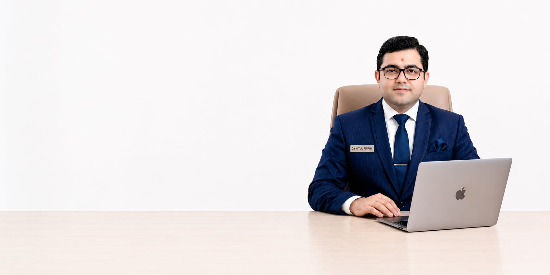 CA Mitul Pujara, FCA — Chartered Accountant Ahmedabad